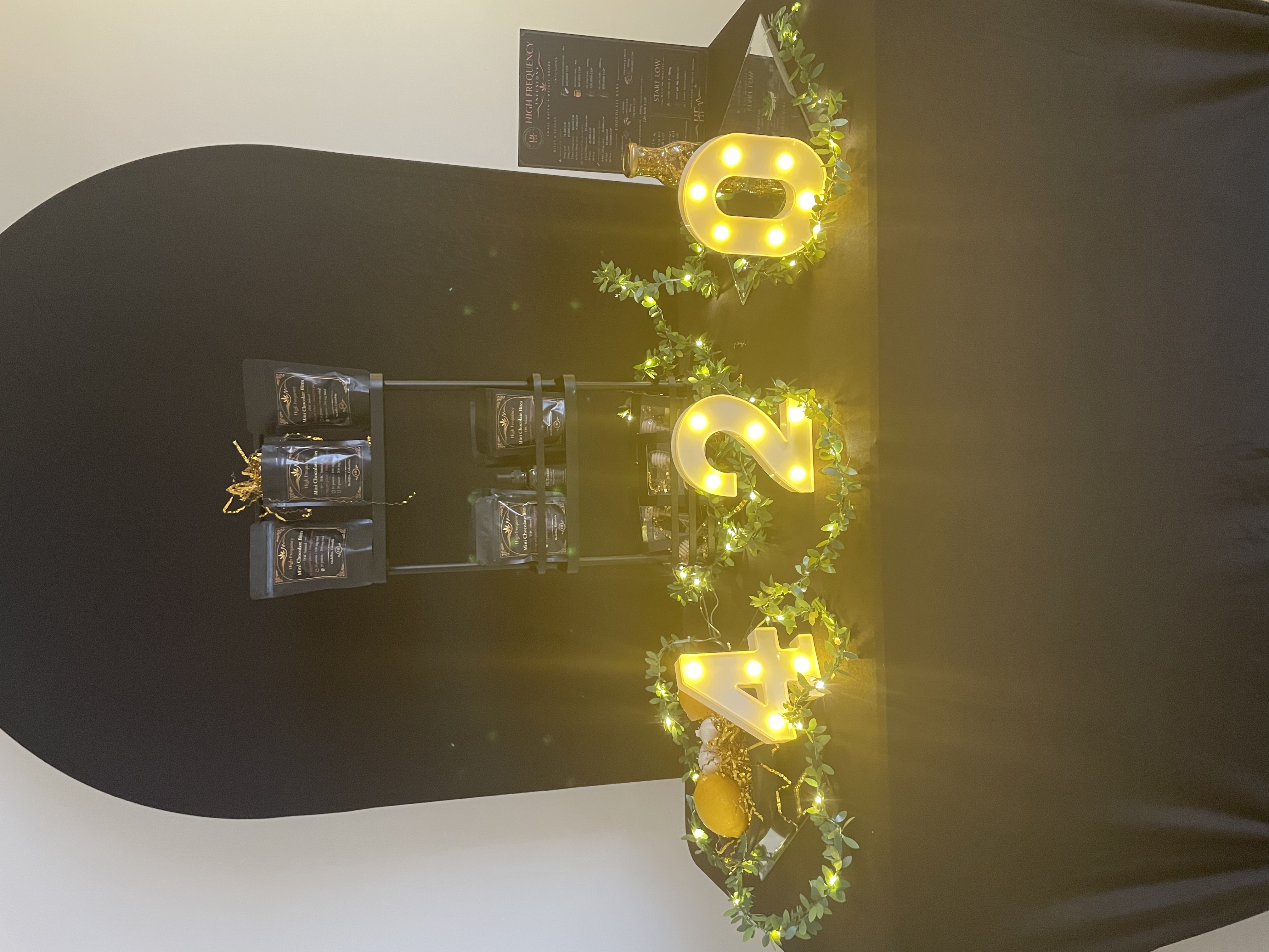 4/20 Afterglow product display with marquee lights